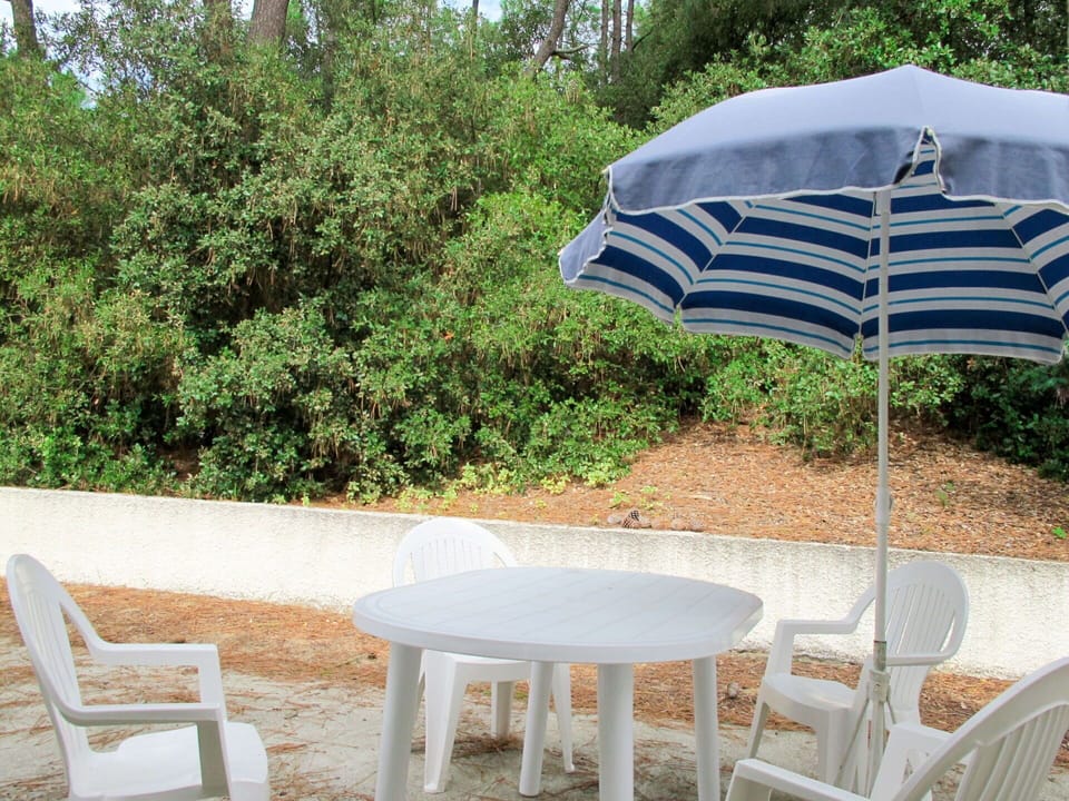 Property, Umbrella, Furniture, Table, Outdoor Furniture, Outdoor Table, Shade, House, Chair, Patio