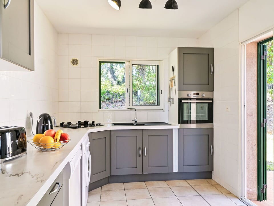 Kitchen Sink, Cabinetry, Countertop, Property, Sink, Kitchen Appliance, Kitchen Stove, Home Appliance, Kitchen, Window