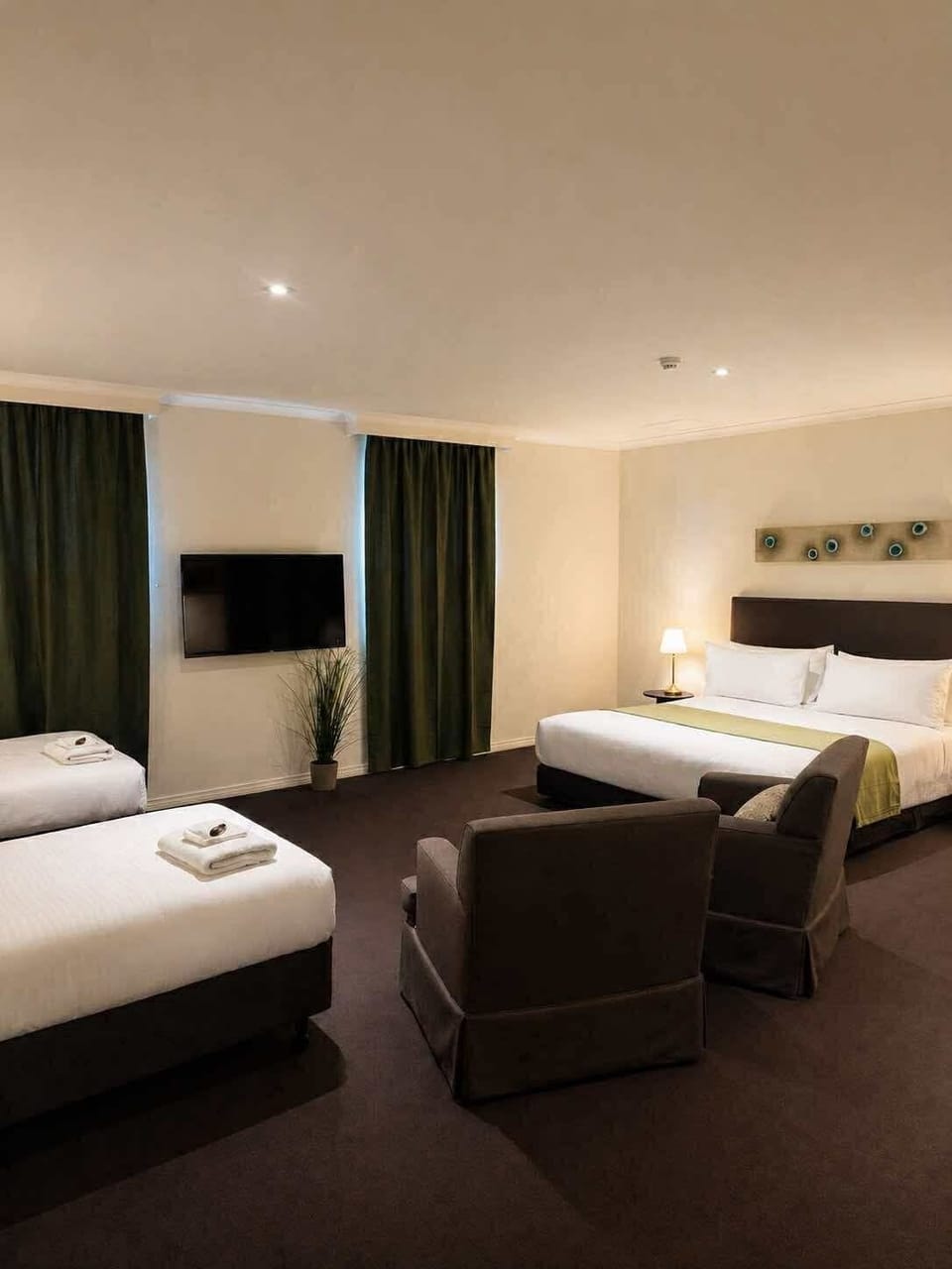 Family Studio, 1 Bedroom | Desk, iron/ironing board, free WiFi, bed sheets