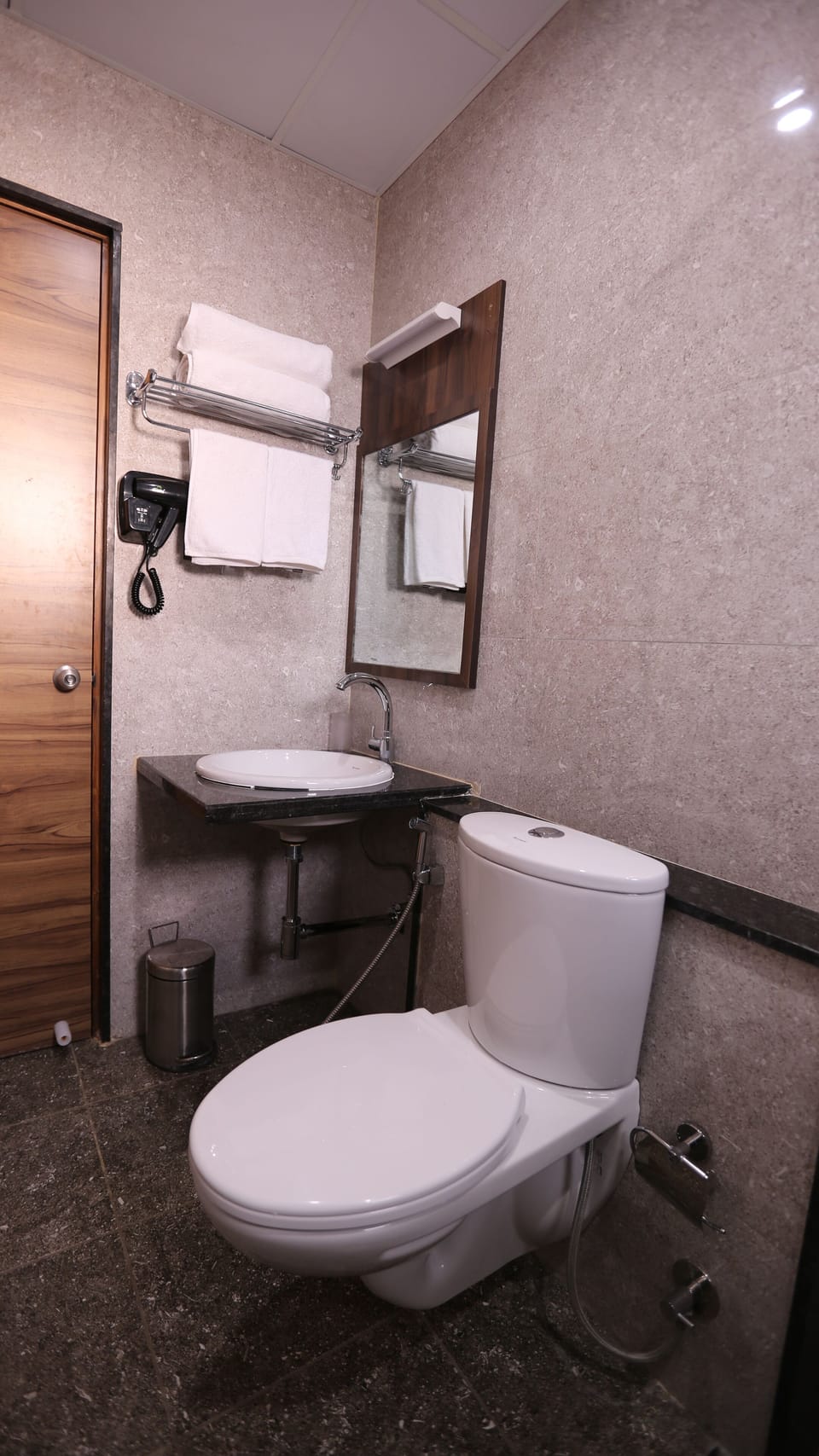 Shower, hydromassage showerhead, hair dryer, towels