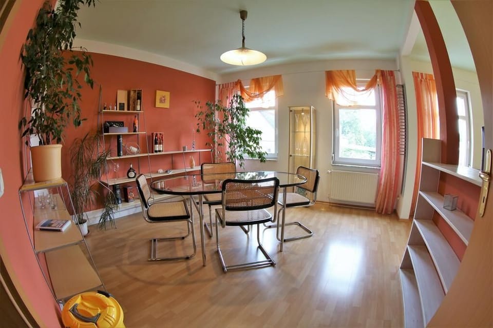 Family Room, Bathtub | Living area | Flat-screen TV, DVD player
