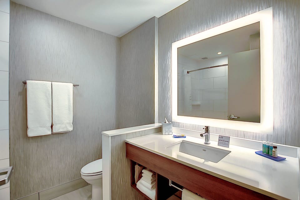 Combined shower/tub, towels, soap, shampoo