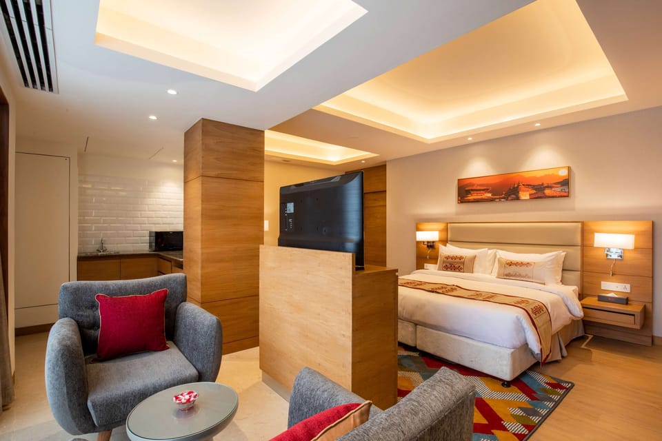 Studio, 1 King Bed, Non Smoking, City View (Kitchen) | Minibar, in-room safe, individually furnished, desk