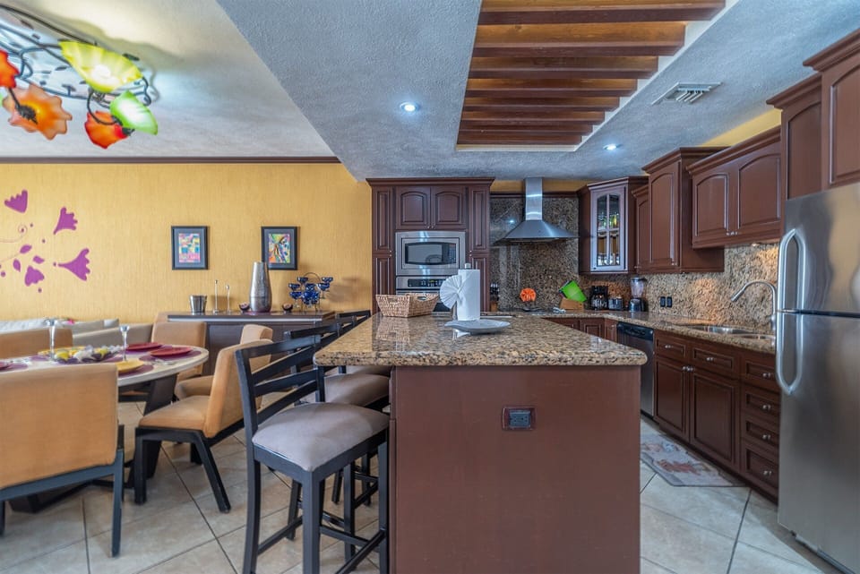 A kitchen island as you enter the kitchen