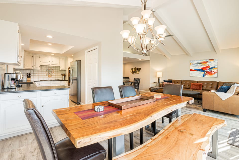 Dining Room with a Gorgeous Live-Edge Wood Table with Seating for Up to Eight