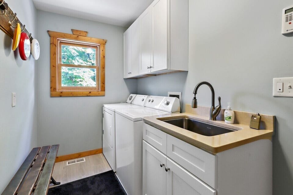 Washer and dryer with mess sink