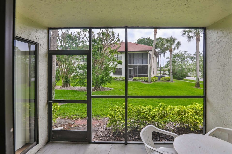 Lush garden views from screened in private lanai.