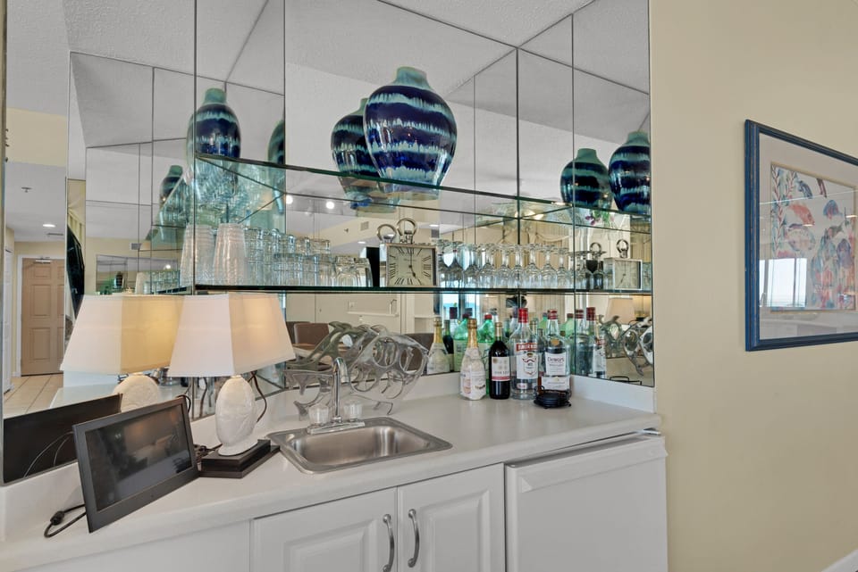 Wet bar to the side of the living room