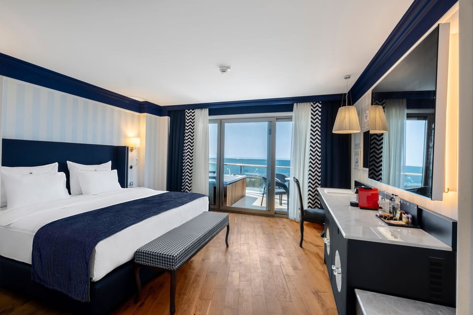 Superior Suite, Jetted Tub | Free minibar, in-room safe, desk, laptop workspace