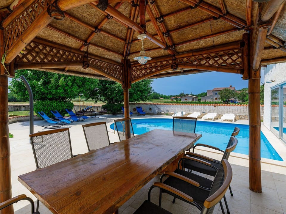 Water, Furniture, Property, Table, Swimming Pool, Blue, Chair, Shade, Outdoor Furniture, Interior Design