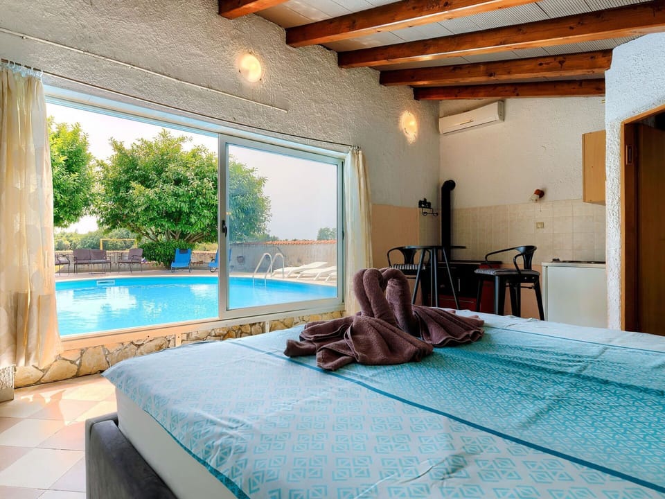 Building, Property, Water, Furniture, Azure, Shade, Interior Design, Window, Wood, Tree
