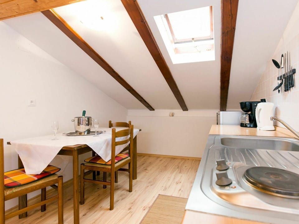Room, Property, Building, Interior Design, House, Attic, Furniture, Table, Floor, Real Estate