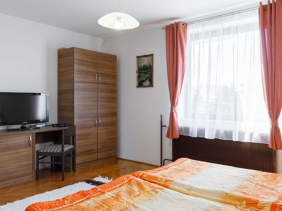 Furniture, Interior Design, Bed, Floor, Flooring, Wood, Bedroom, Room, Textile, Lighting