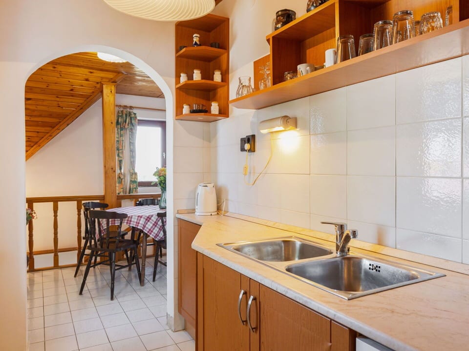 Wood, Interior Design, Ceiling, Floor, Flooring, Furniture, Cabinetry, Countertop, Kitchen, Door