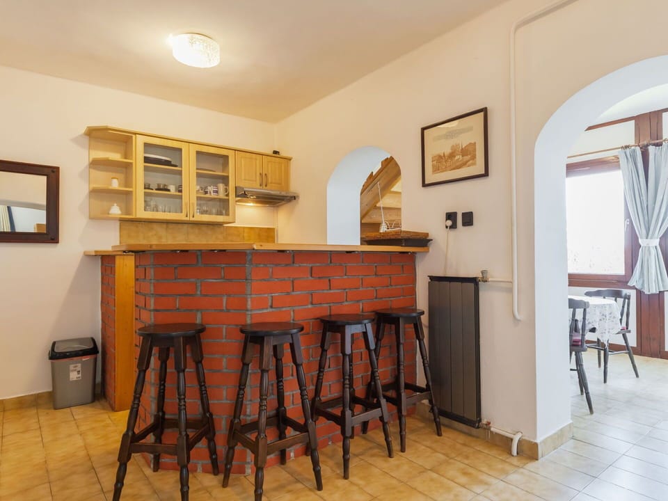 Furniture, Interior Design, Flooring, Wood, Ceiling, Floor, Bar Stool, Lighting, Room, Light Fixture