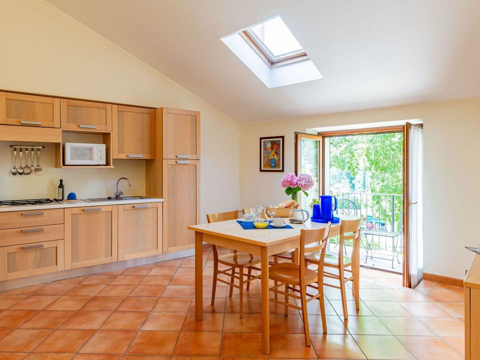 Furniture, Cabinetry, Property, Table, Countertop, Window, Chair, Wood, Lighting, Interior Design