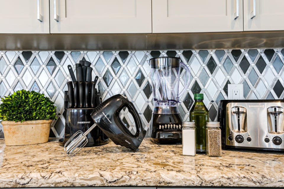A few of the many kitchen essentials provided. Stocked in Every Home.