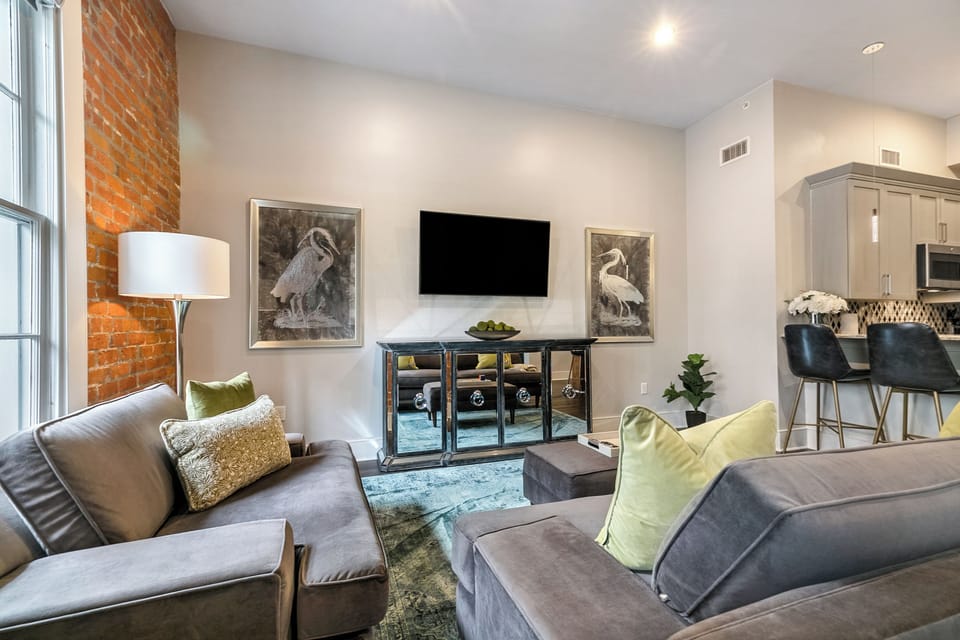 Open concept living, kitchen, dining area with comfortable seating options for you and your guests. 58” Samsung Smart 4K TV for streaming from apps, along with the DIRECTV Entertainment. Dining table with seating for four. All the natural light too!