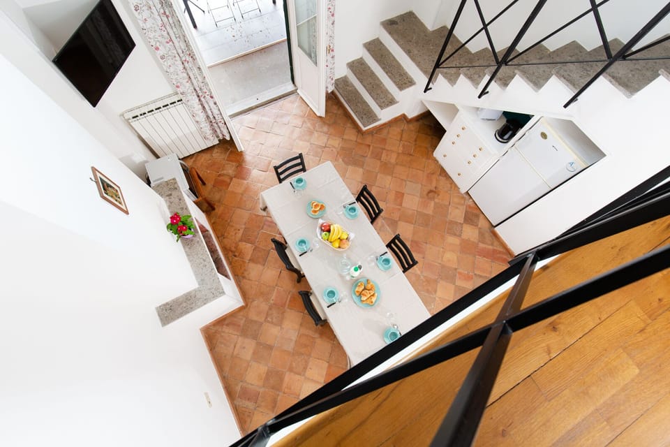 Family Apartment, 2 Bedrooms (TC3) | Living area | 32-inch TV with satellite channels, fireplace