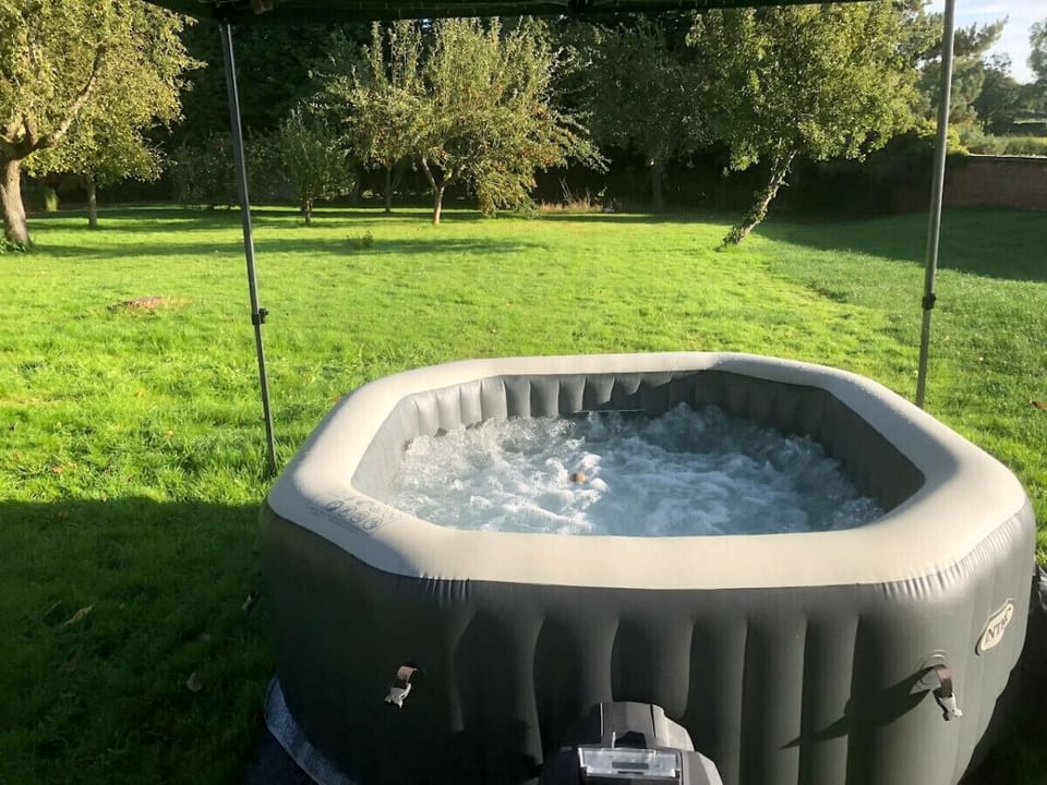 Your hot tub in your private walled garden