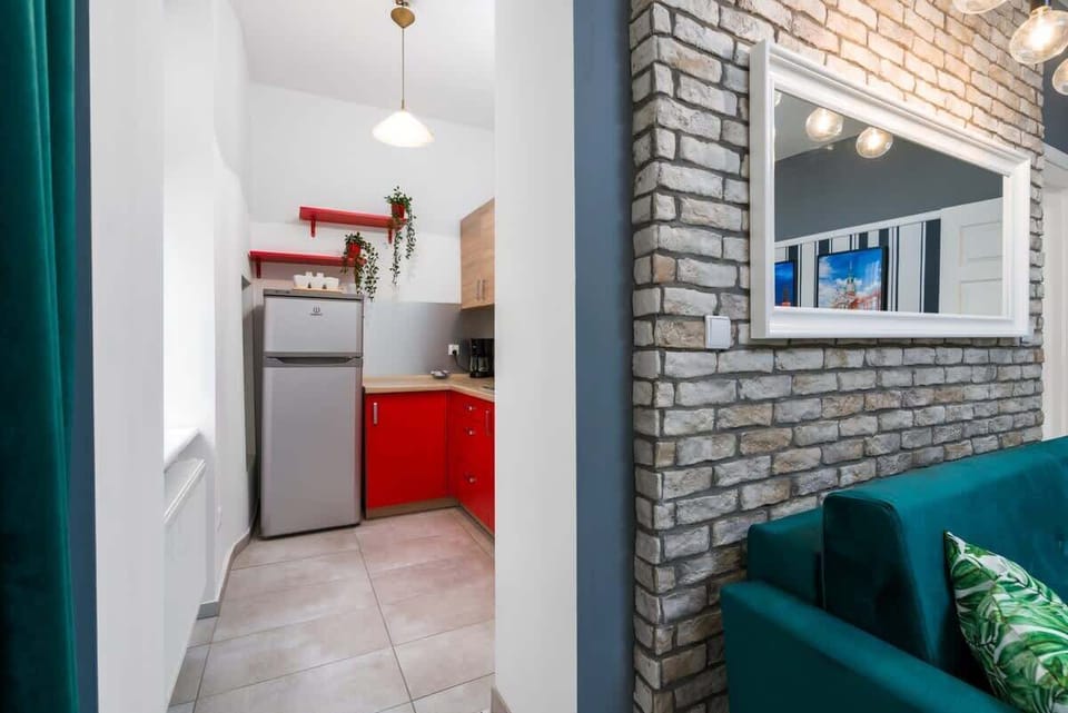 The kitchen is fully equipped with high-quality appliances for all your culinary needs.