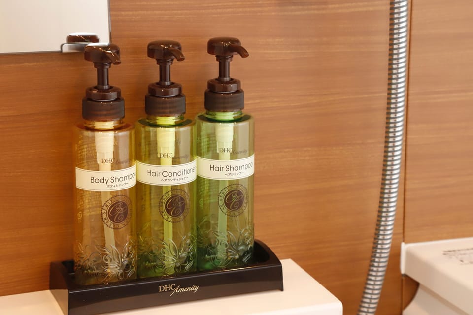 Free toiletries, hair dryer, slippers, electronic bidet