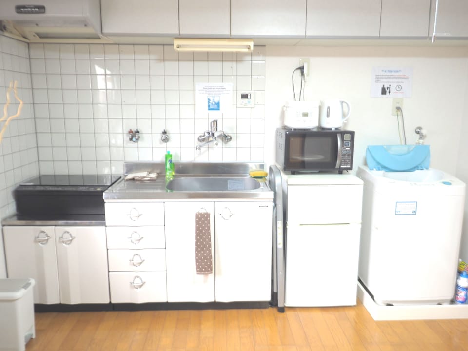 Holiday Home | Private kitchen | Fridge, microwave, stovetop, electric kettle
