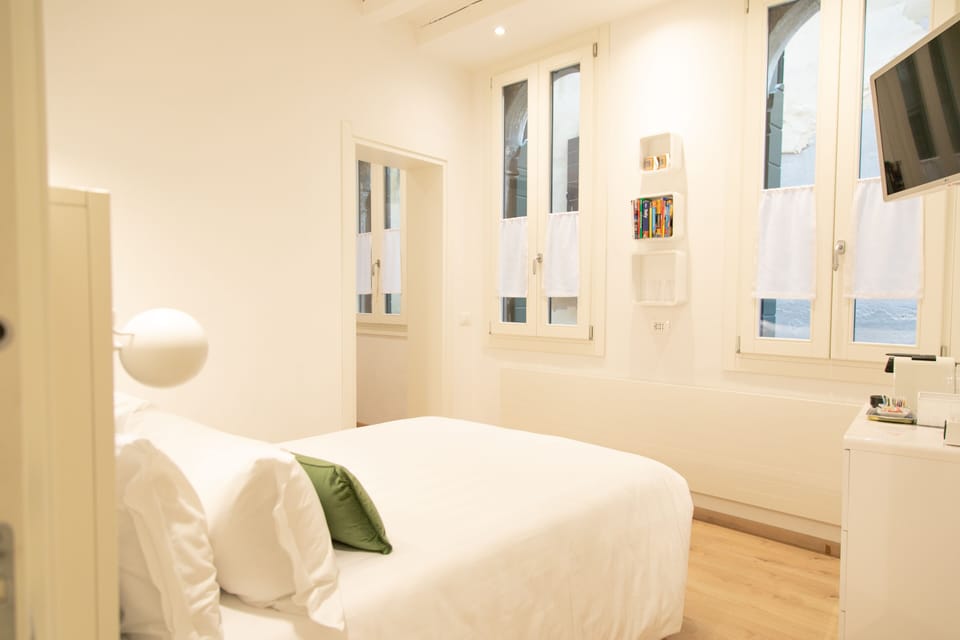 Premium bedding, down comforters, pillowtop beds, in-room safe