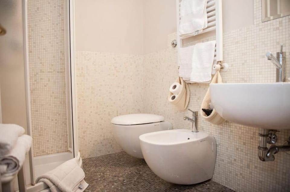 Classic Single Room, Non Smoking, Private Bathroom | Bathroom | Hair dryer, slippers, towels