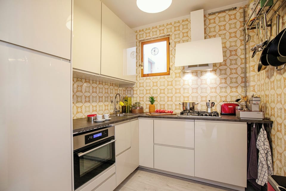 Family Apartment, Multiple Bedrooms, Lakeside (Spiaggia Azzurro -lakeside with) | Private kitchen | Full-size fridge, microwave, oven, stovetop
