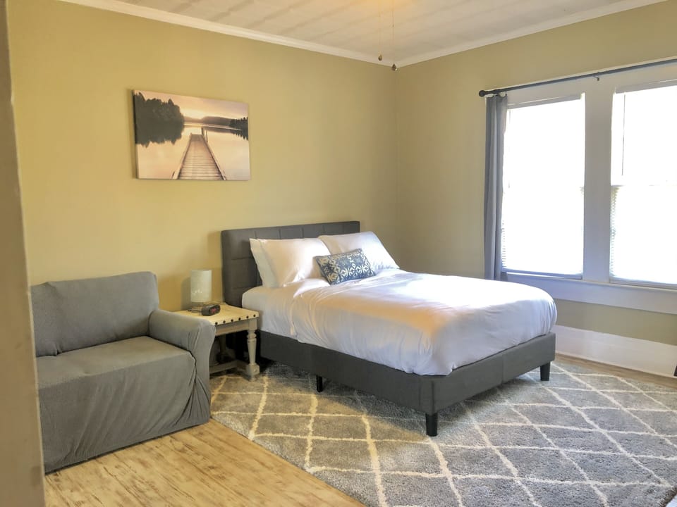 Full-sized bed with twin-sized sofa bed