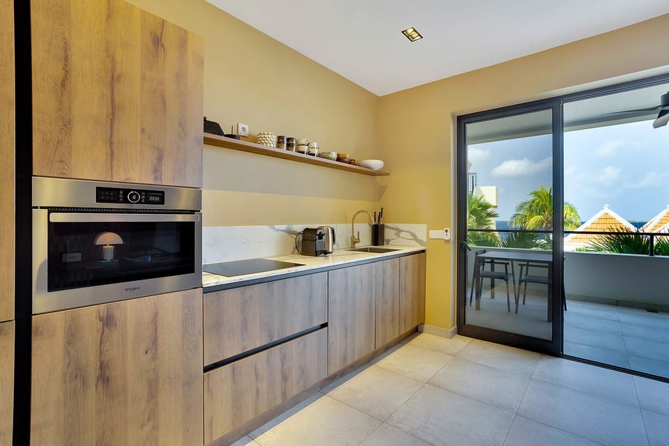 Apartment, 1 Bedroom, Ocean View | Private kitchen | Shared fridge, espresso maker, coffee/tea maker, electric kettle
