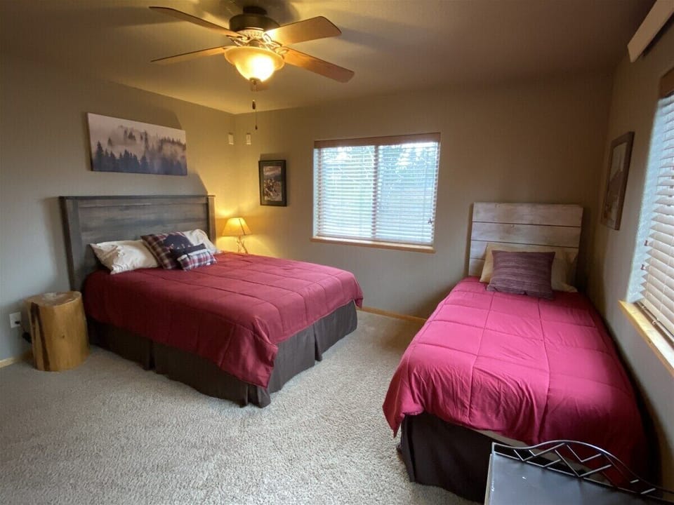 Main Floor bedroom 2 with queen and twin and lofted twin
