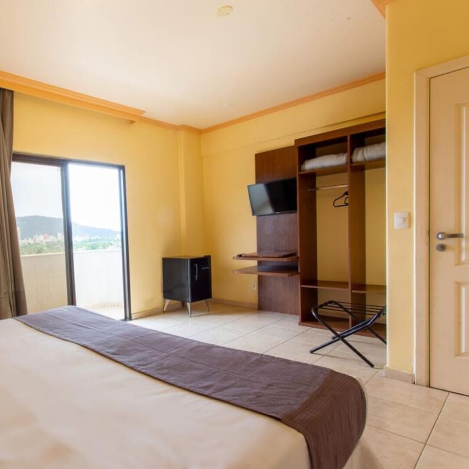 Minibar, desk, blackout drapes, soundproofing