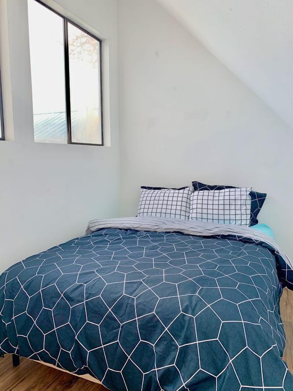 Second floor bedroom; queen bed