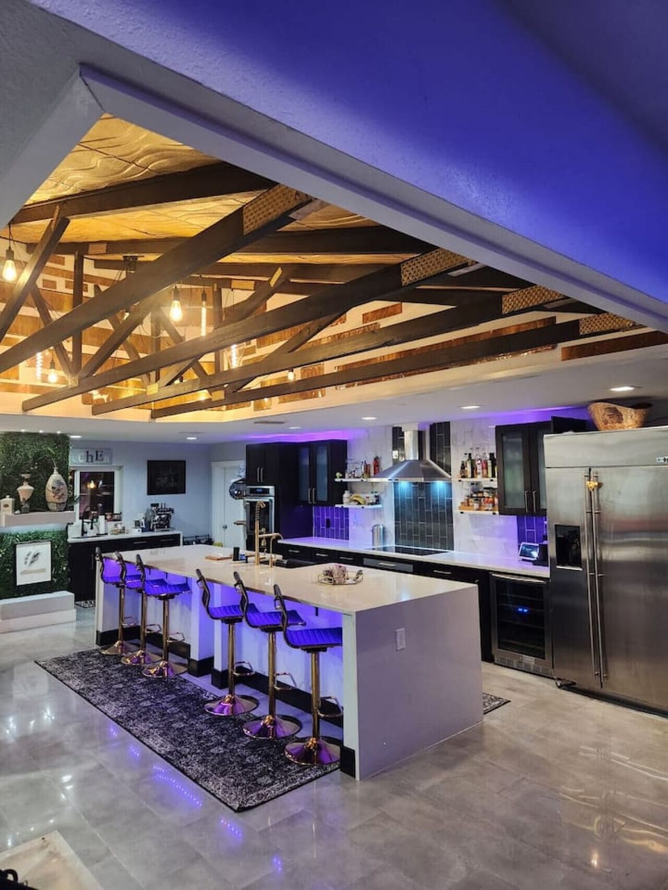 Stunning gourmet kitchen with LED accent lighting and exposed wood beams, Orlando vacation home