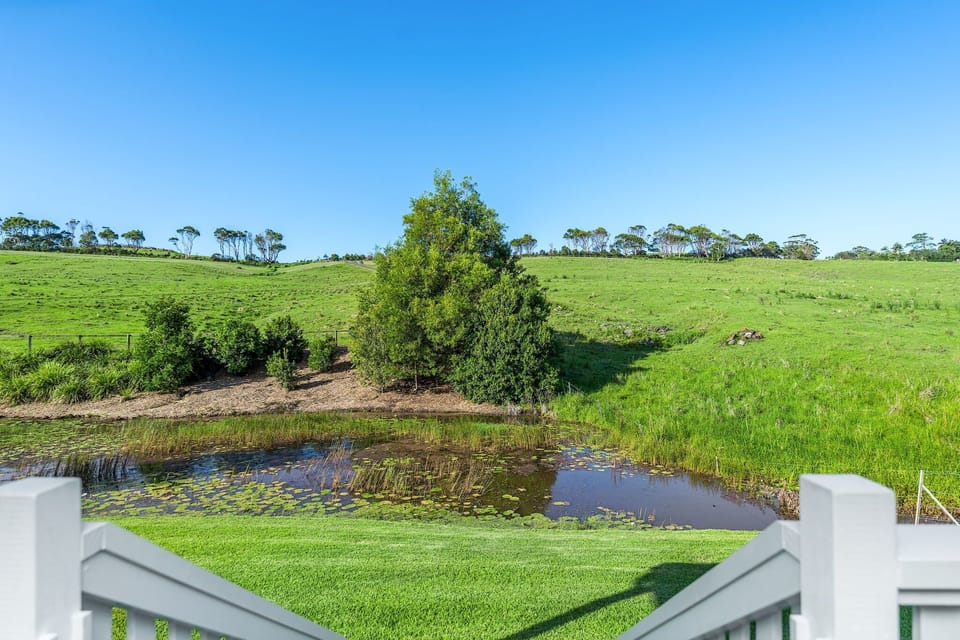 Step off the verandah onto the green grass