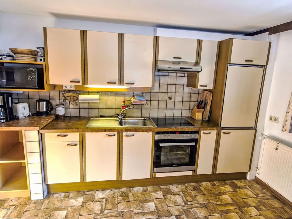 Kitchen, Wood, Major Appliance, Kitchen Appliance, Flooring, Countertop, Interior Design, Cabinetry, Kitchen Sink, Floor