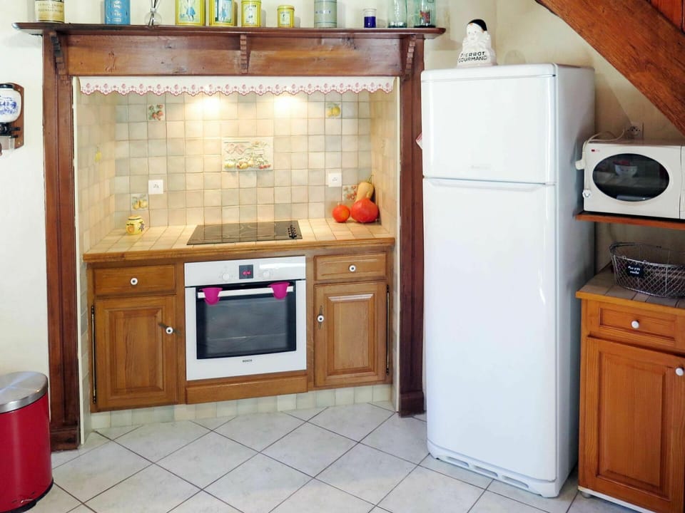 Cabinetry, Countertop, Furniture, Kitchen Appliance, Kitchen Stove, Home Appliance, Kitchen, Drawer, Stove, Wood