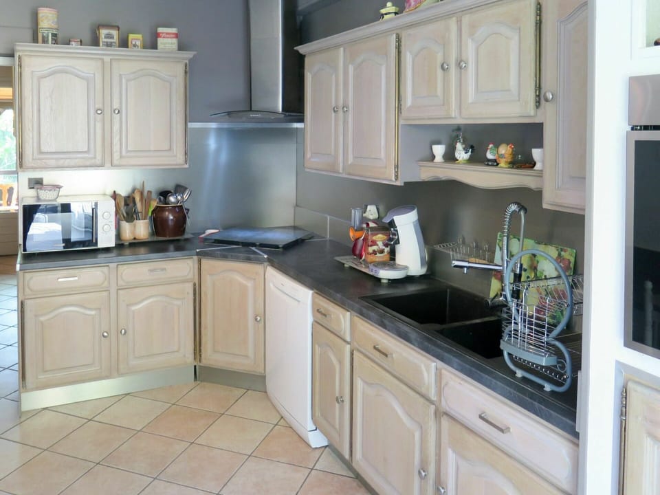 Countertop, Cabinetry, Property, Furniture, White, Kitchen, Drawer, Wood, Kitchen Stove, Interior Design