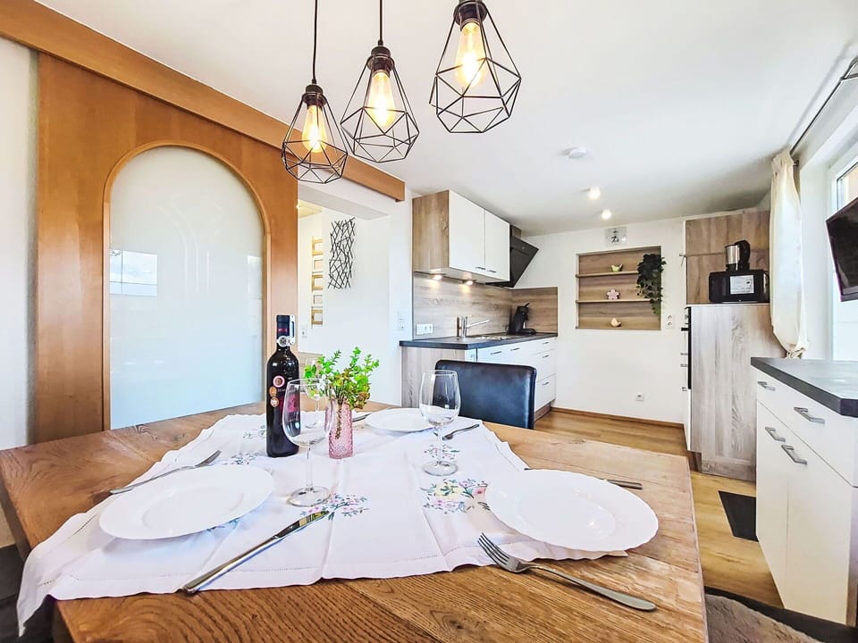 Furniture, Interior Design, Flooring, Wood, Ceiling, Floor, Light Fixture, Room, Lighting, Wood Flooring