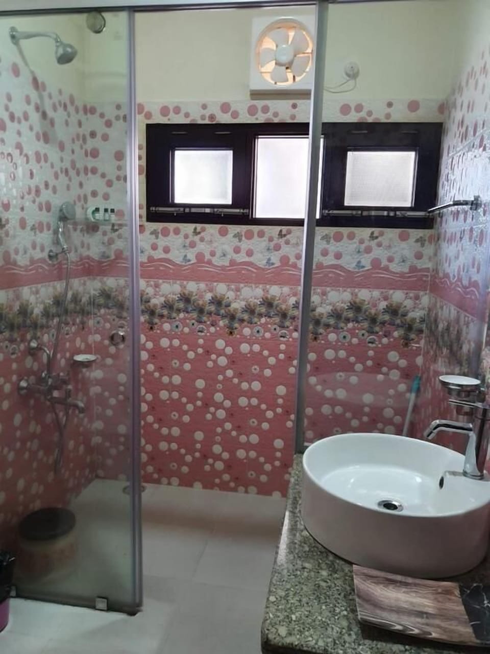 Shower, free toiletries, hair dryer, slippers