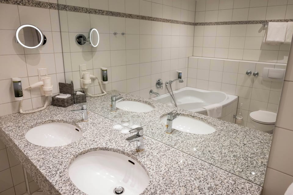 Suite, 1 Bedroom | Bathroom | Shower, hair dryer, towels