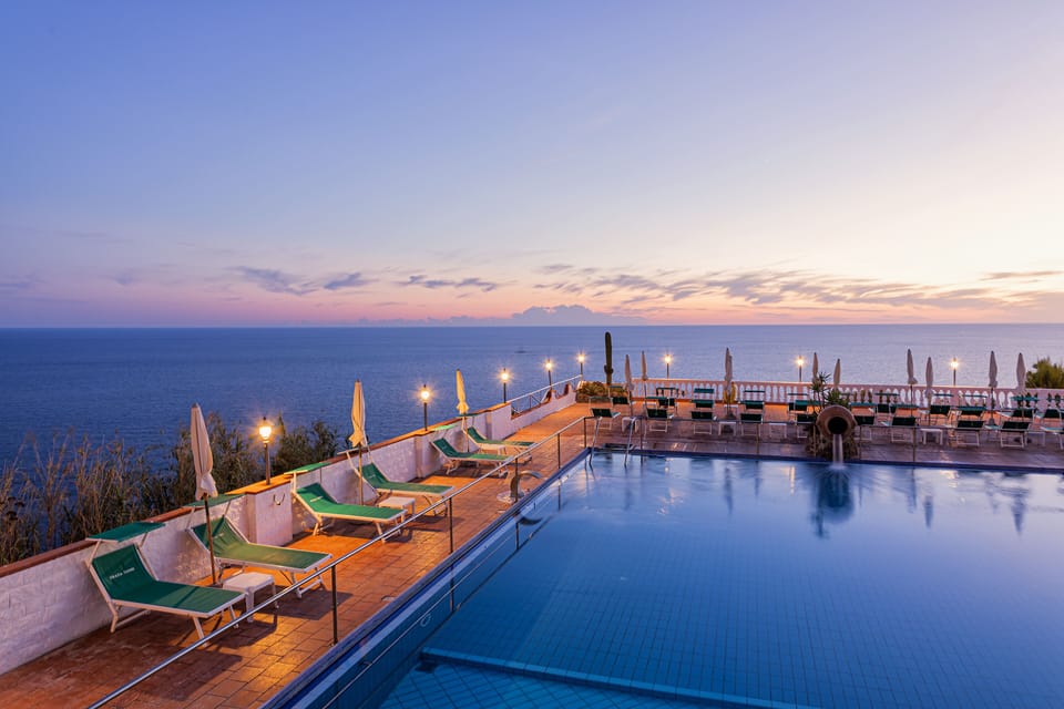 Indoor pool, seasonal outdoor pool, pool umbrellas, sun loungers