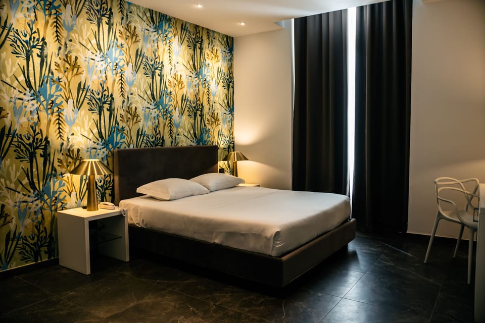 Room | Premium bedding, down comforters, memory foam beds, minibar