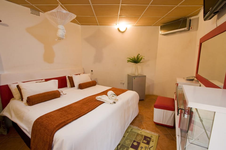 Deluxe Double Room | Premium bedding, minibar, desk, laptop workspace