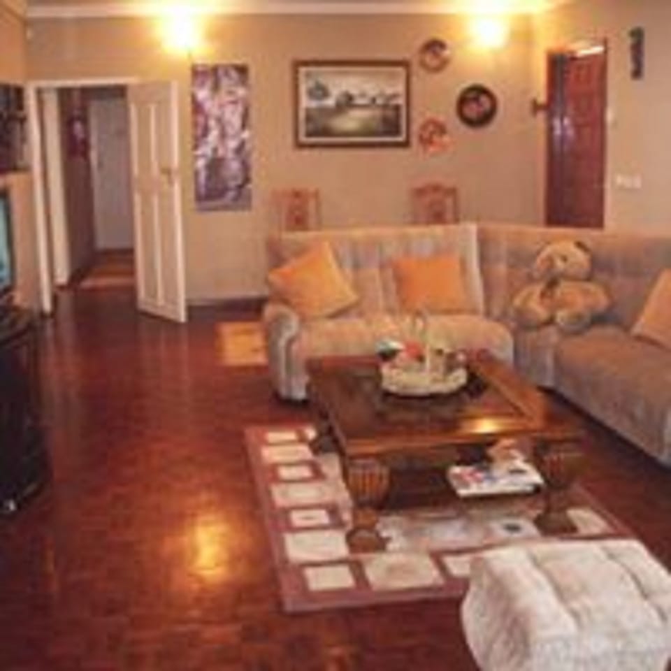 Executive Double Room | Living area | 32-inch LCD TV with cable channels, TV