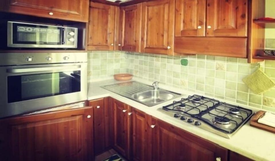 Apartment, 1 Bedroom (Roncombrellaro) | Private kitchenette | Fridge, stovetop, cookware/dishes/utensils