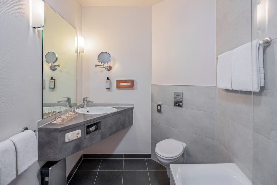 Family Room, Multiple Beds | Bathroom | Shower, eco-friendly toiletries, hair dryer, towels