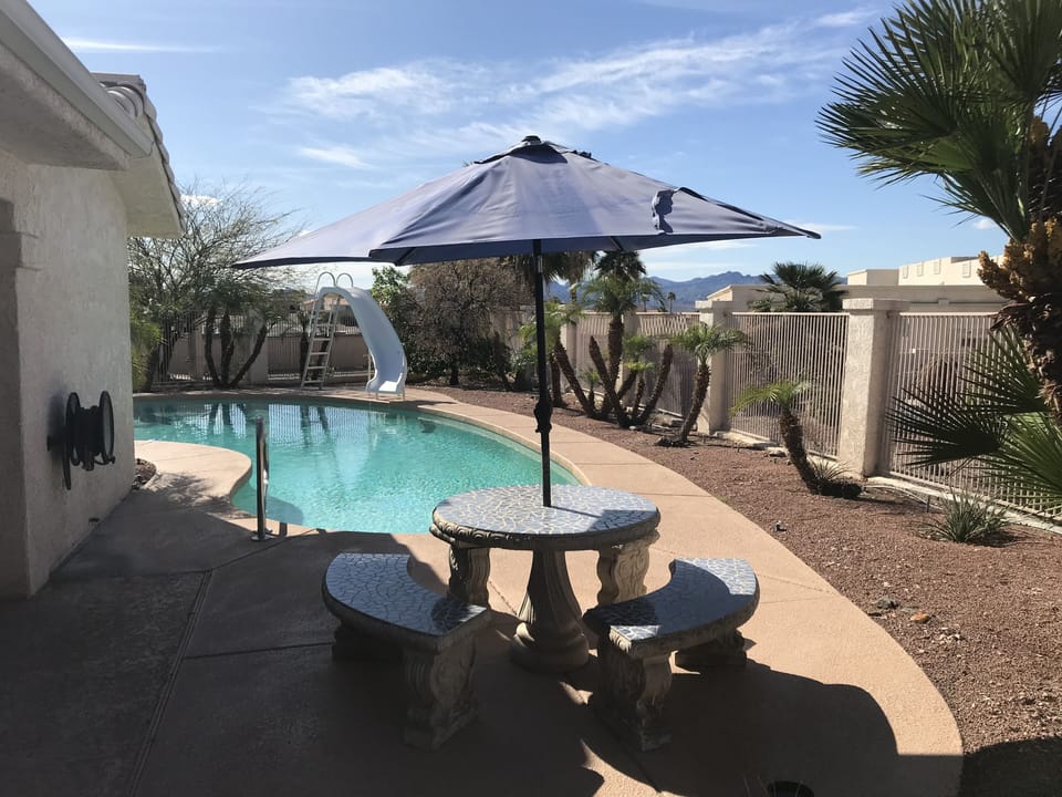 Pool and picnic table.